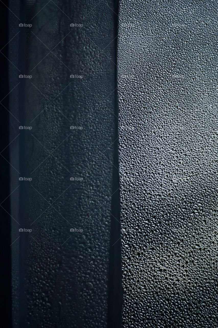 Frosted windowpane, a telltale sign of winter. 