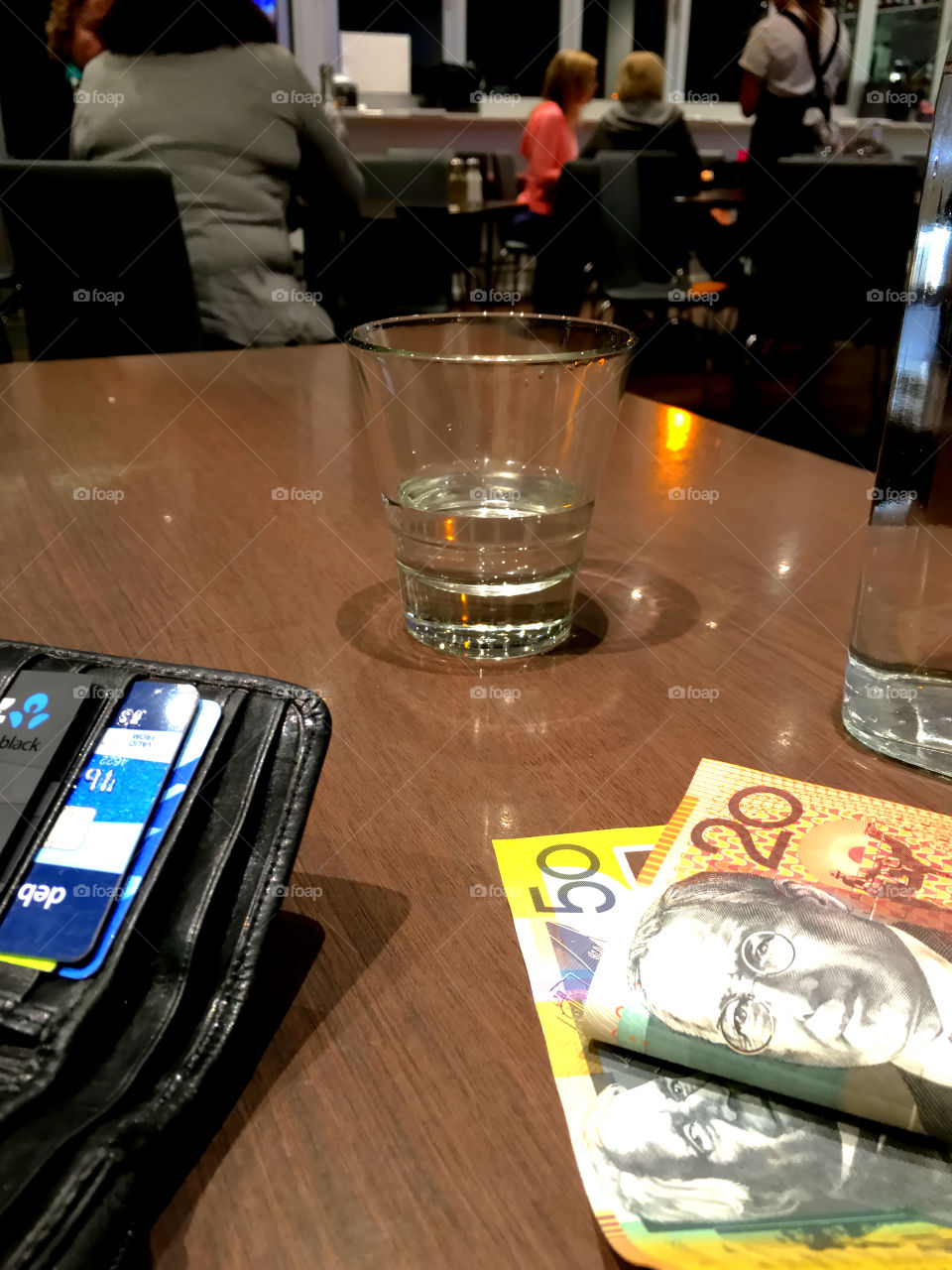 Australian currency on restaurant table