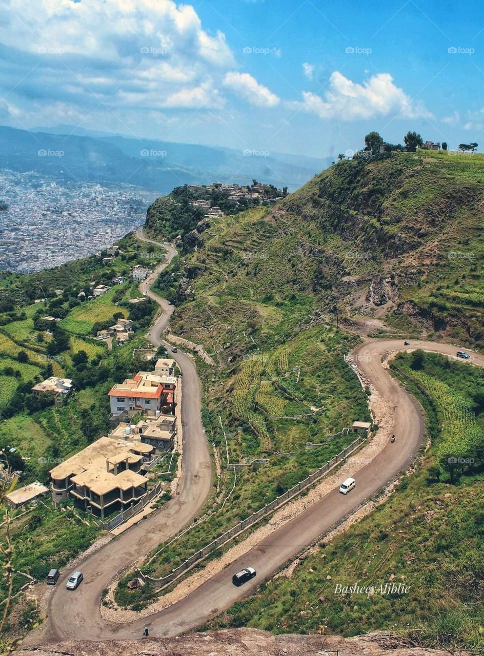 Glory be to God, the magnificent and picturesque view and the natural green trees are a view that is nothing more wonderful than it