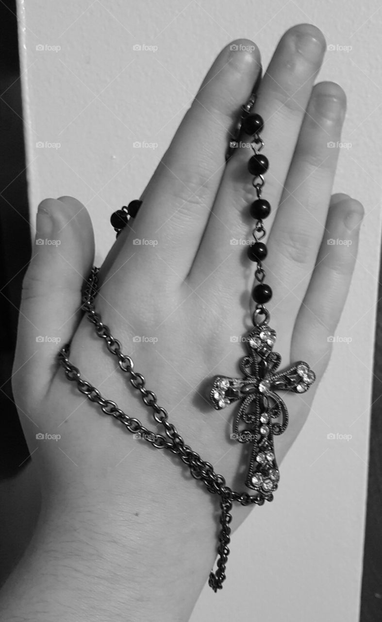 black and white praying hands