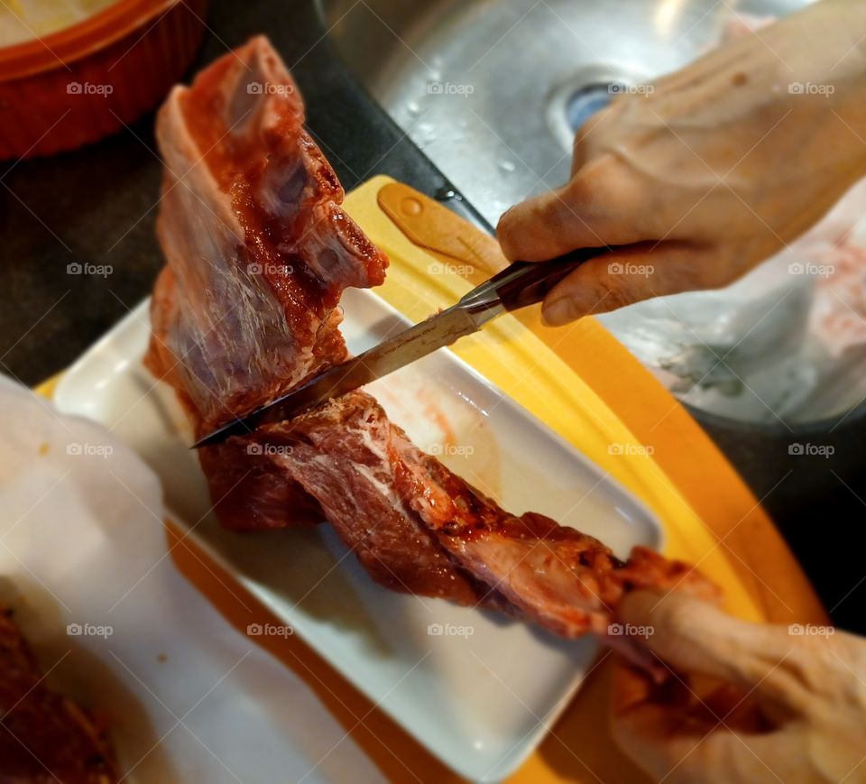 Fresh lamb chop preparation.