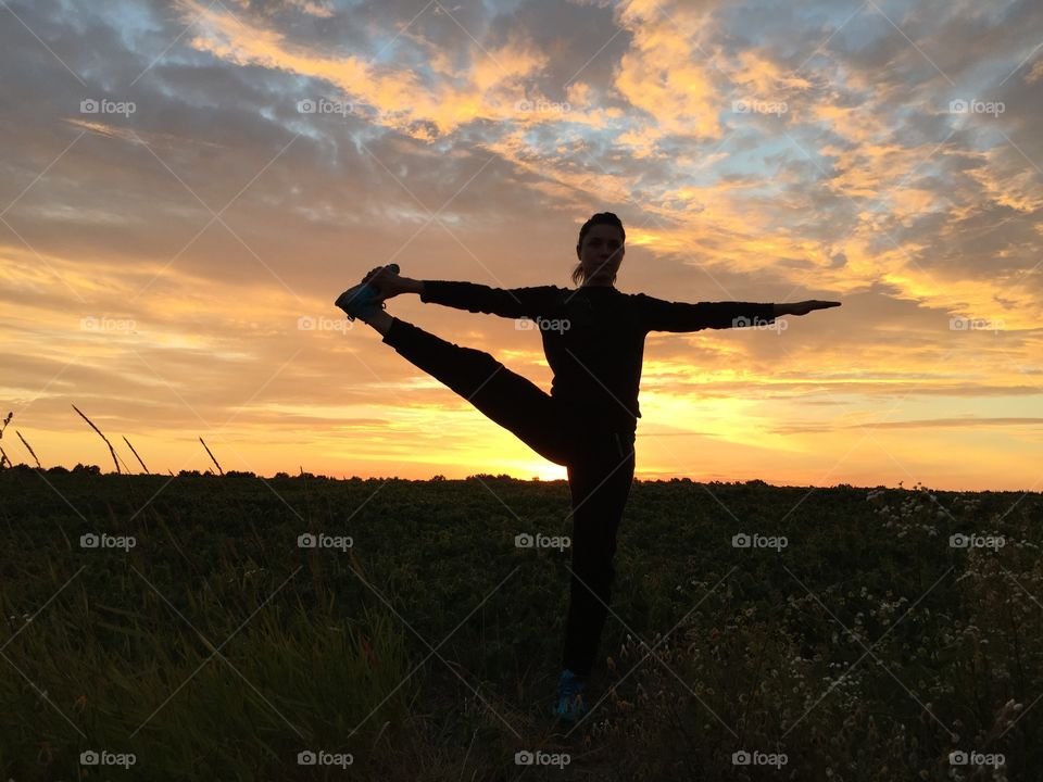 Practice yoga at sunset 