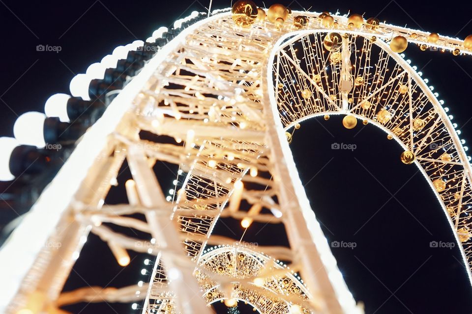 Garland illuminated night sky lights close-up