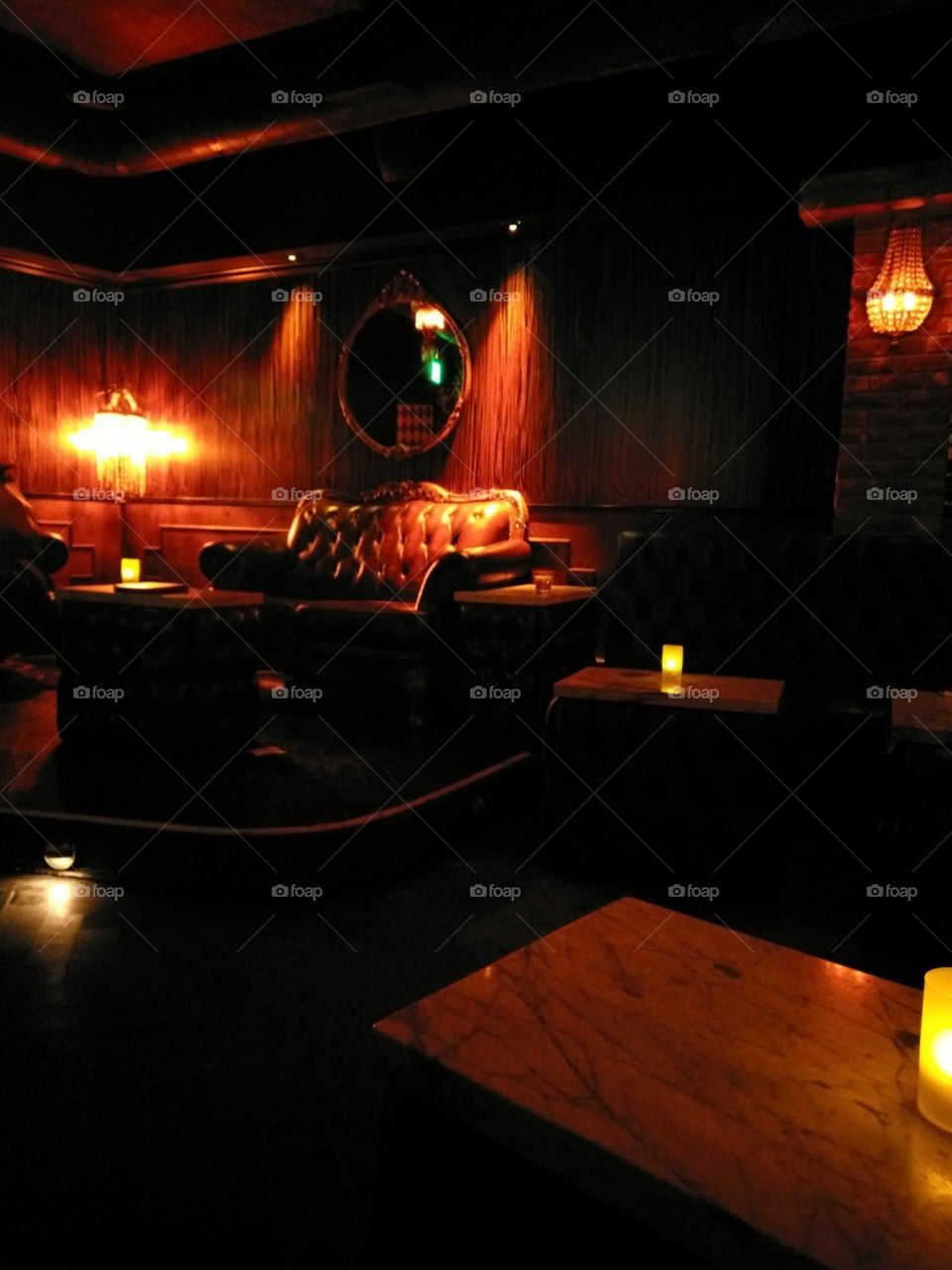 The parlour room bar in Hollywood California lounge area with red lighting
