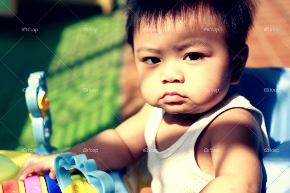 Little boy on a walker