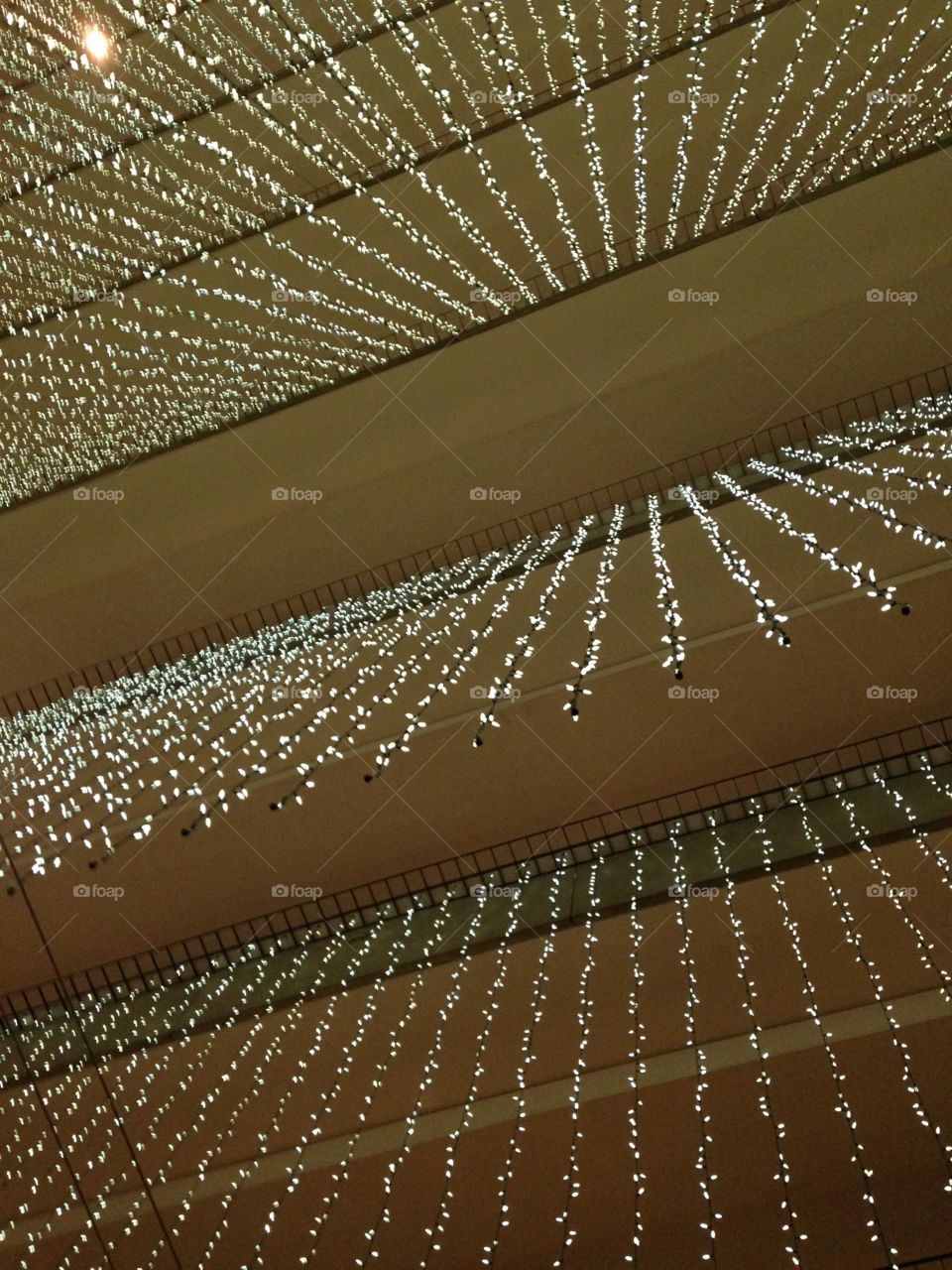 Dangling Lights . I was inside a hotel in San fransico and I looked up and this is what I saw 