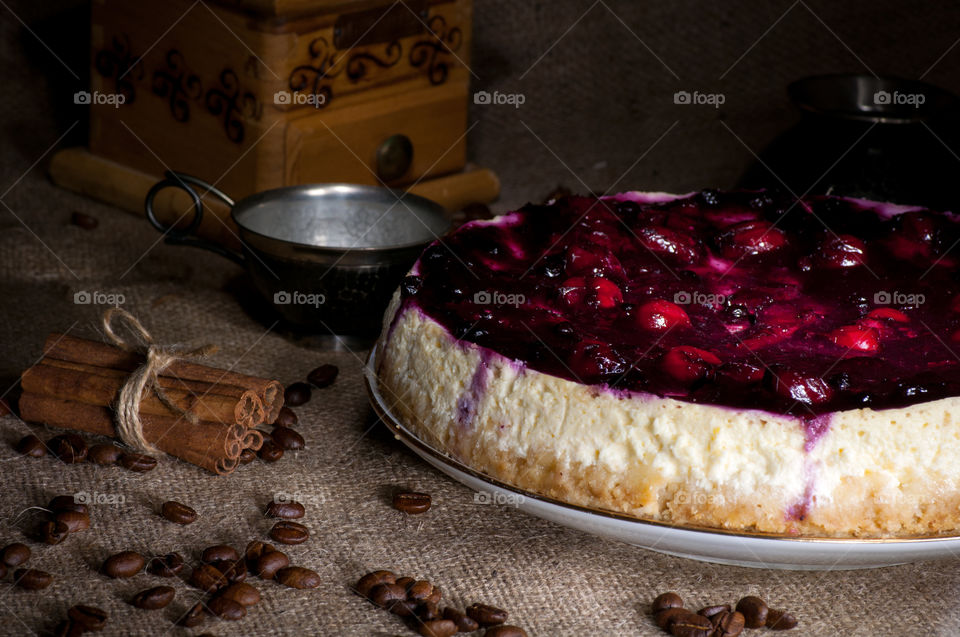 Close-up of cherry cake and cinnamon