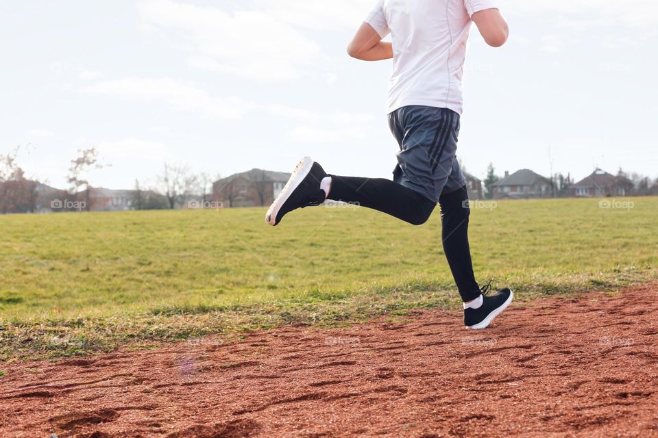 man running at track