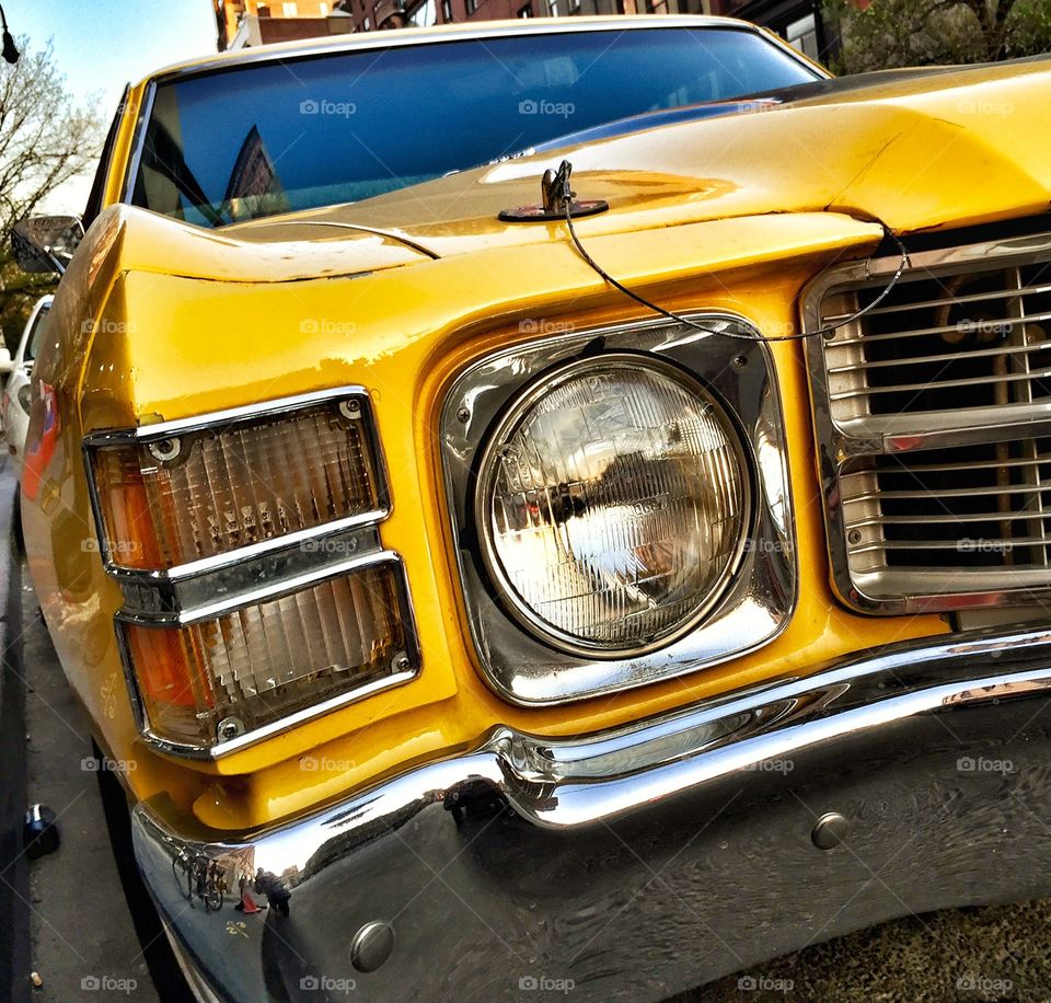 Yellow Chevrolet Chevelle. Yellow Chevrolet Chevelle Headlight, New York City 