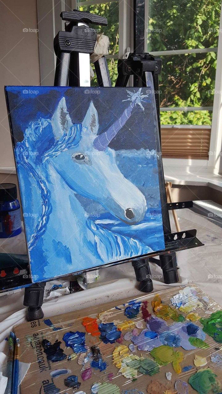 Beautiful blue unicorn painting.