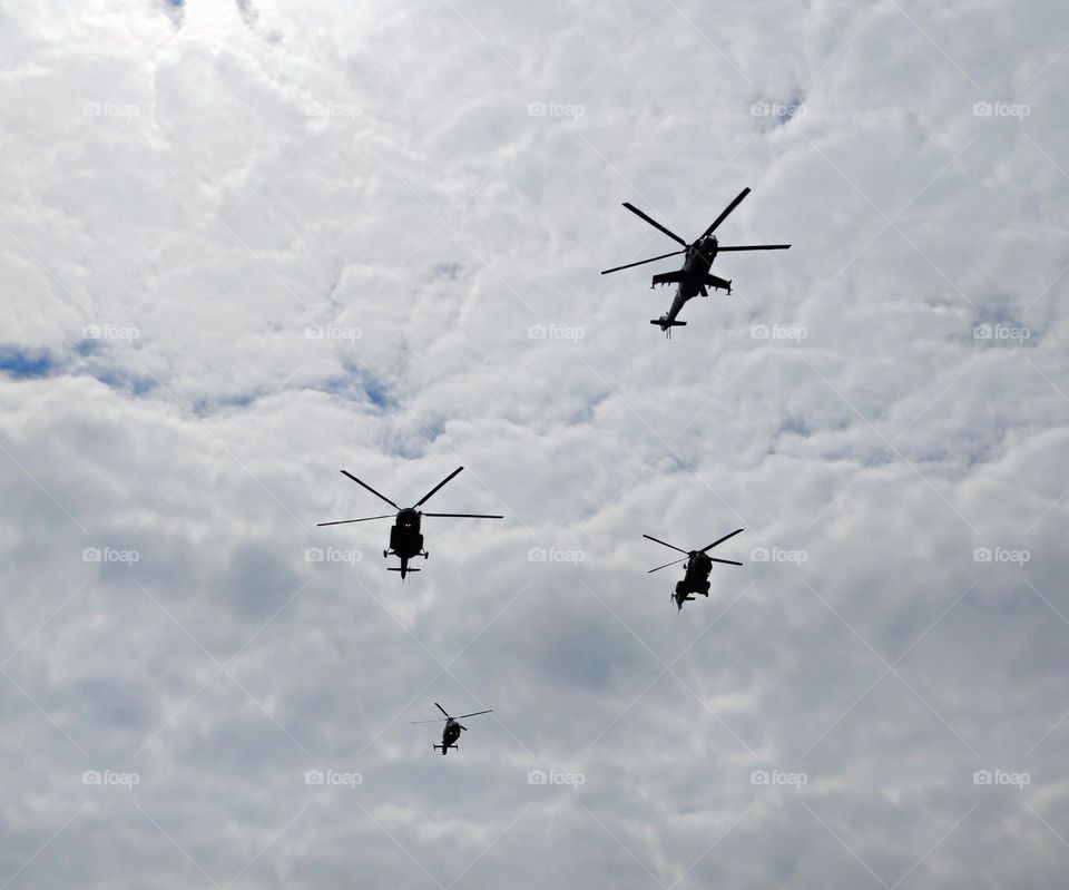 Four helicopters over the city