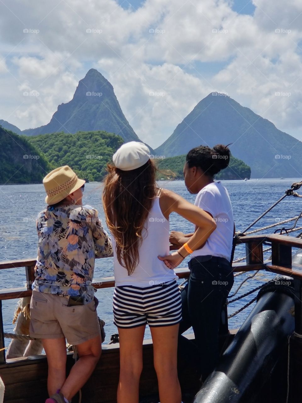 Some female conversation with the historic famous pitons in the background