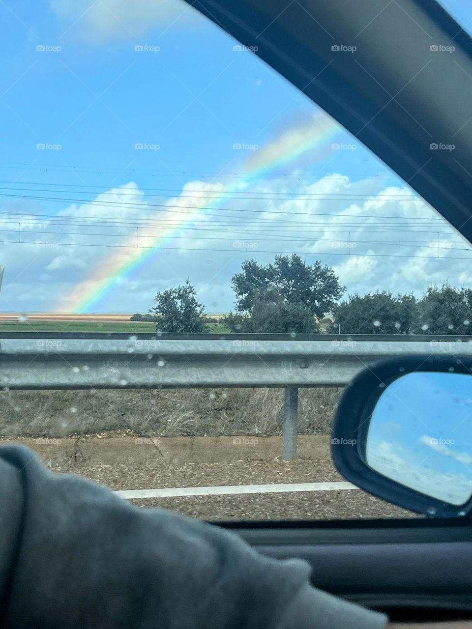 View from car window and mirror 
