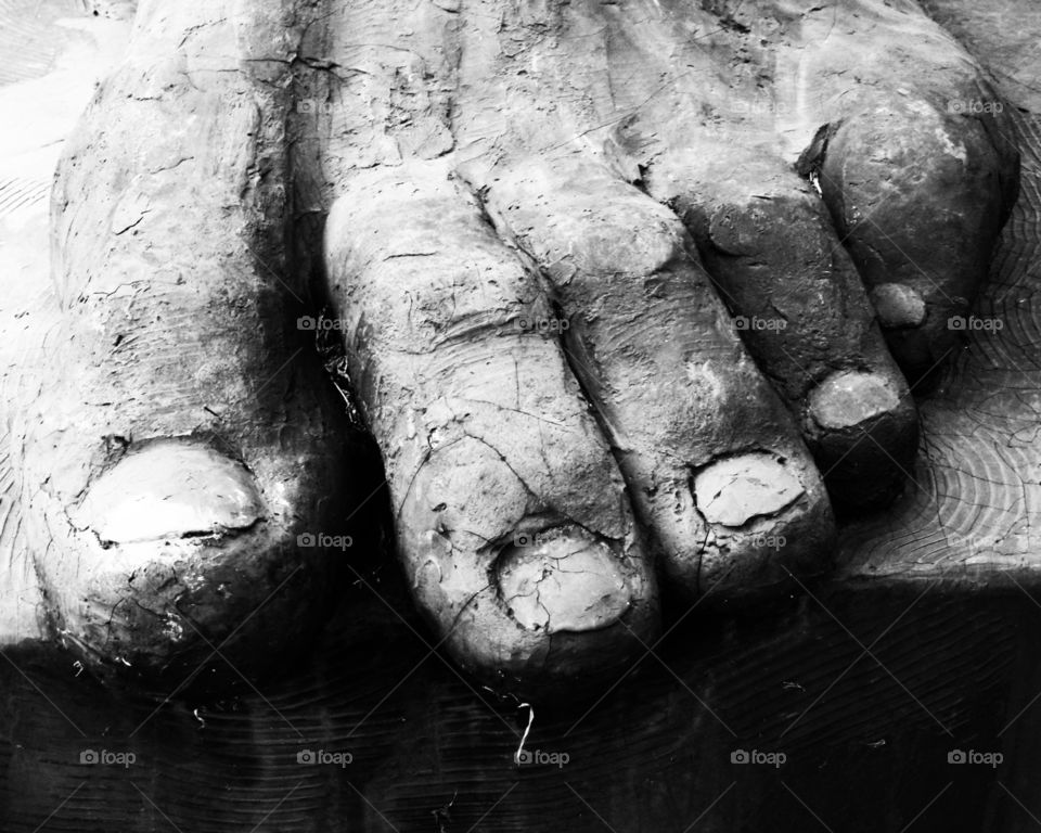 Sculpted toes of statue