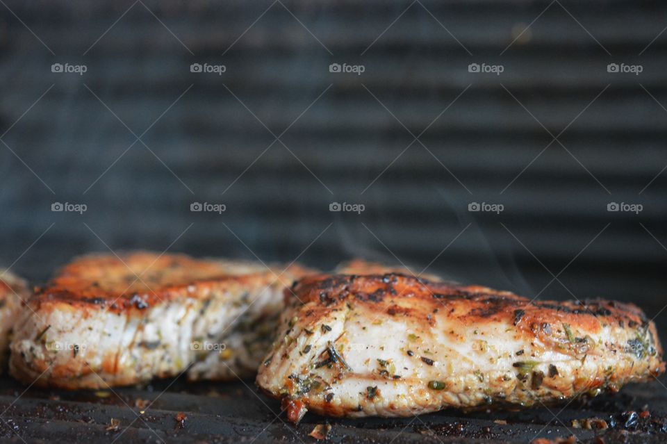 Cooking food on grill