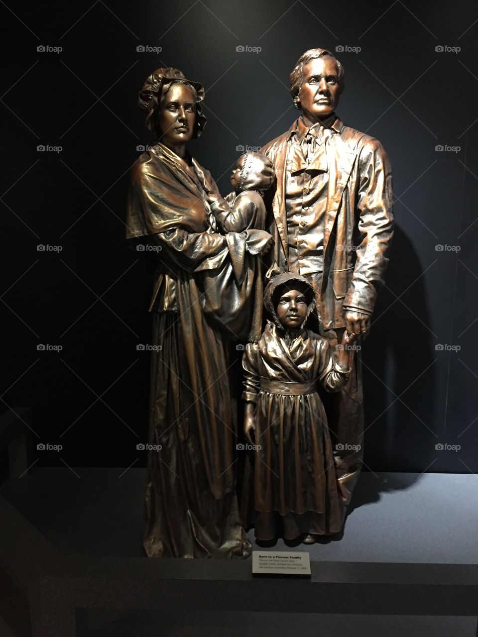 Bronze statue of Abraham Lincoln as an infant with his parents and sister. At the Abraham Lincoln Birthplace National Park in LaRue County, Kentucky. 