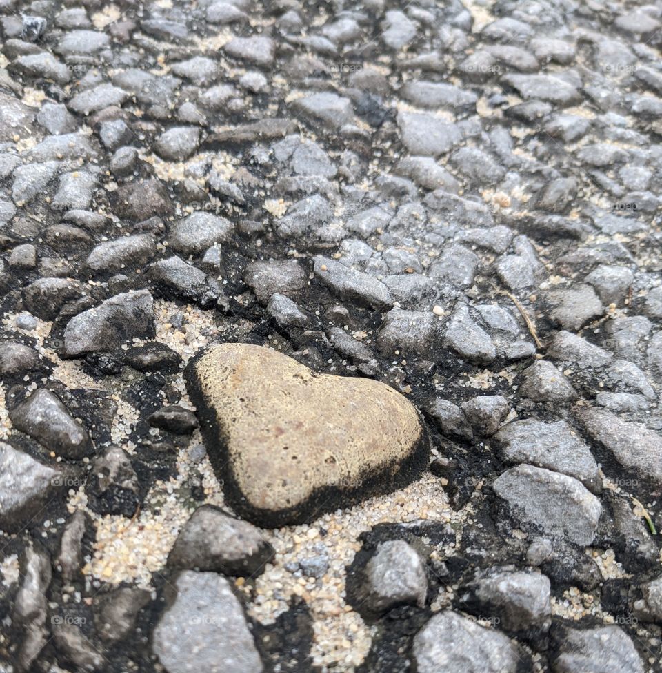 heart of stone embedded into road