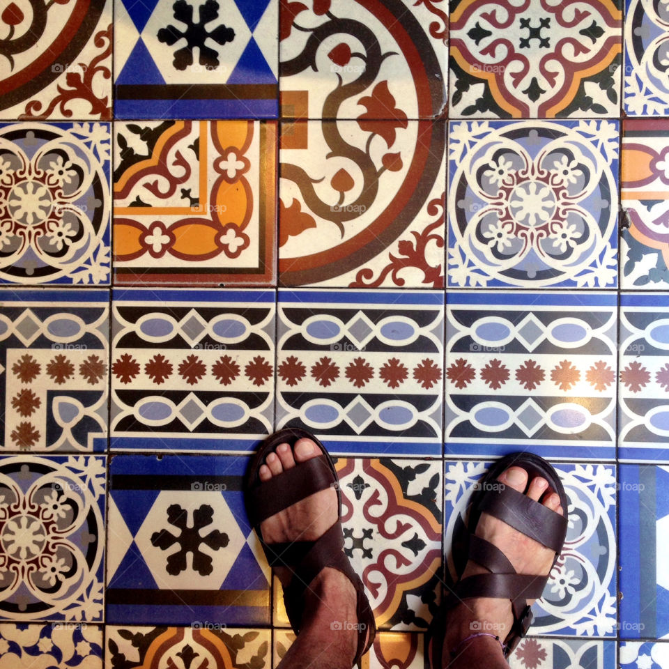 sandals feet and tiles
