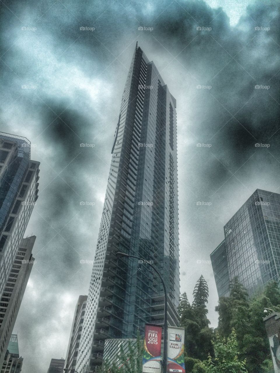 City skyline . Dramatic glass building 