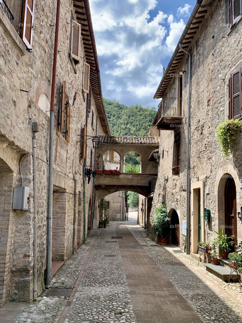 a picturesque glimpse of a medieval street in Sheggino, an Umbrian town located in the middle of the Nera river valley