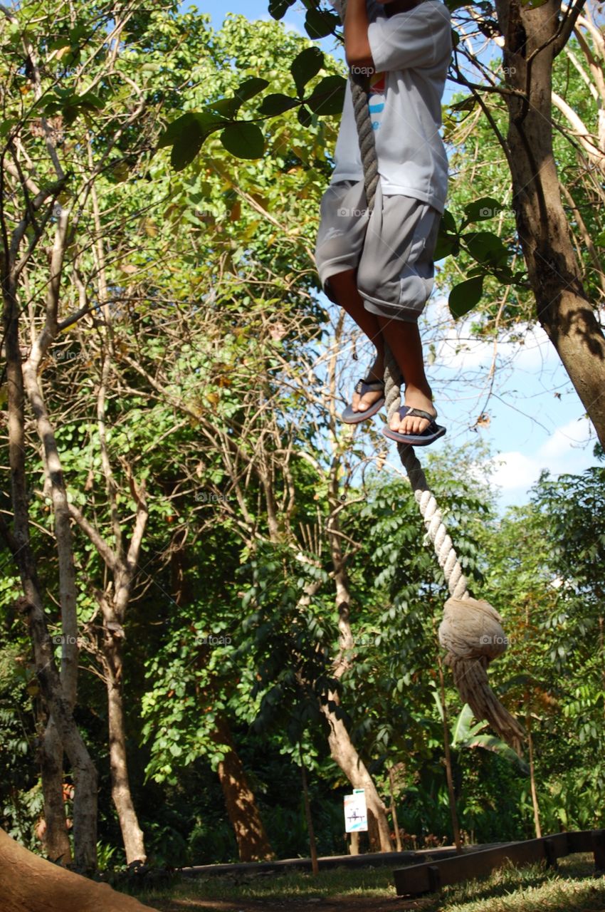 Climbing up a rope