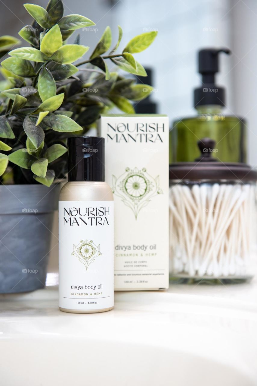 Product shot of Nourish Mantra body oil