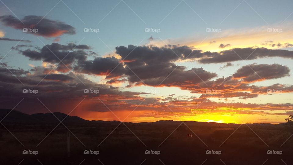 sunset. a mid summer sunset in the pilbara