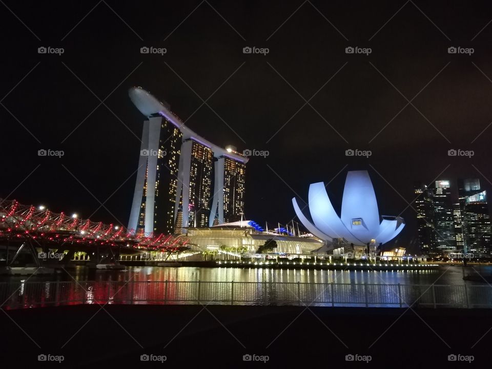 Marina Bay Sands Hotel at night. A beautiful scenery with awesome lighting. An architectural ingenuity.