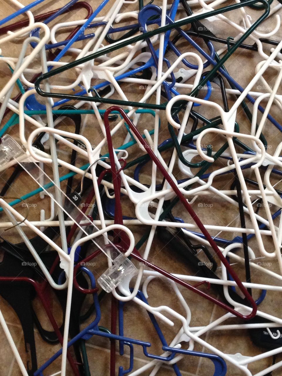 Pile of clothes hangers after purging