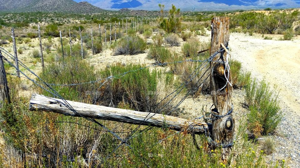 Broken fence Alone in the Desert
