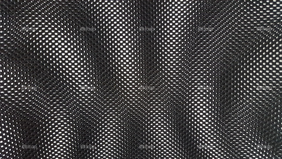 Creative texture - black and white holes, abstract pattern 