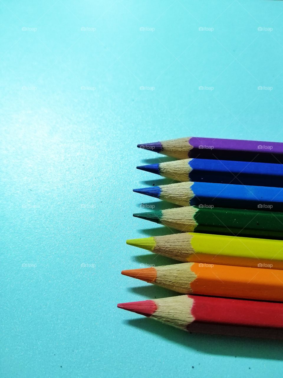Watercolor pencils in rainbow colors.