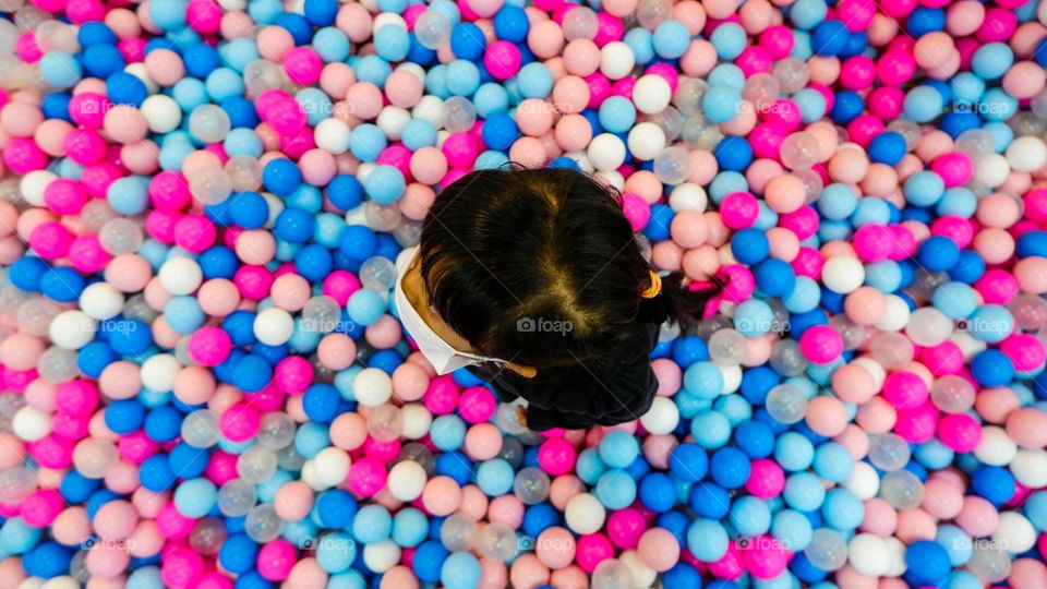 playing colorful balls on the playground