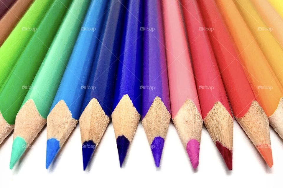 colored pencils in a row