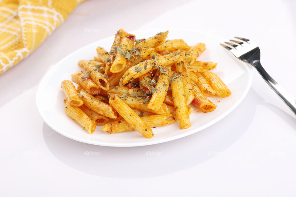 Penne Pasta food on white background