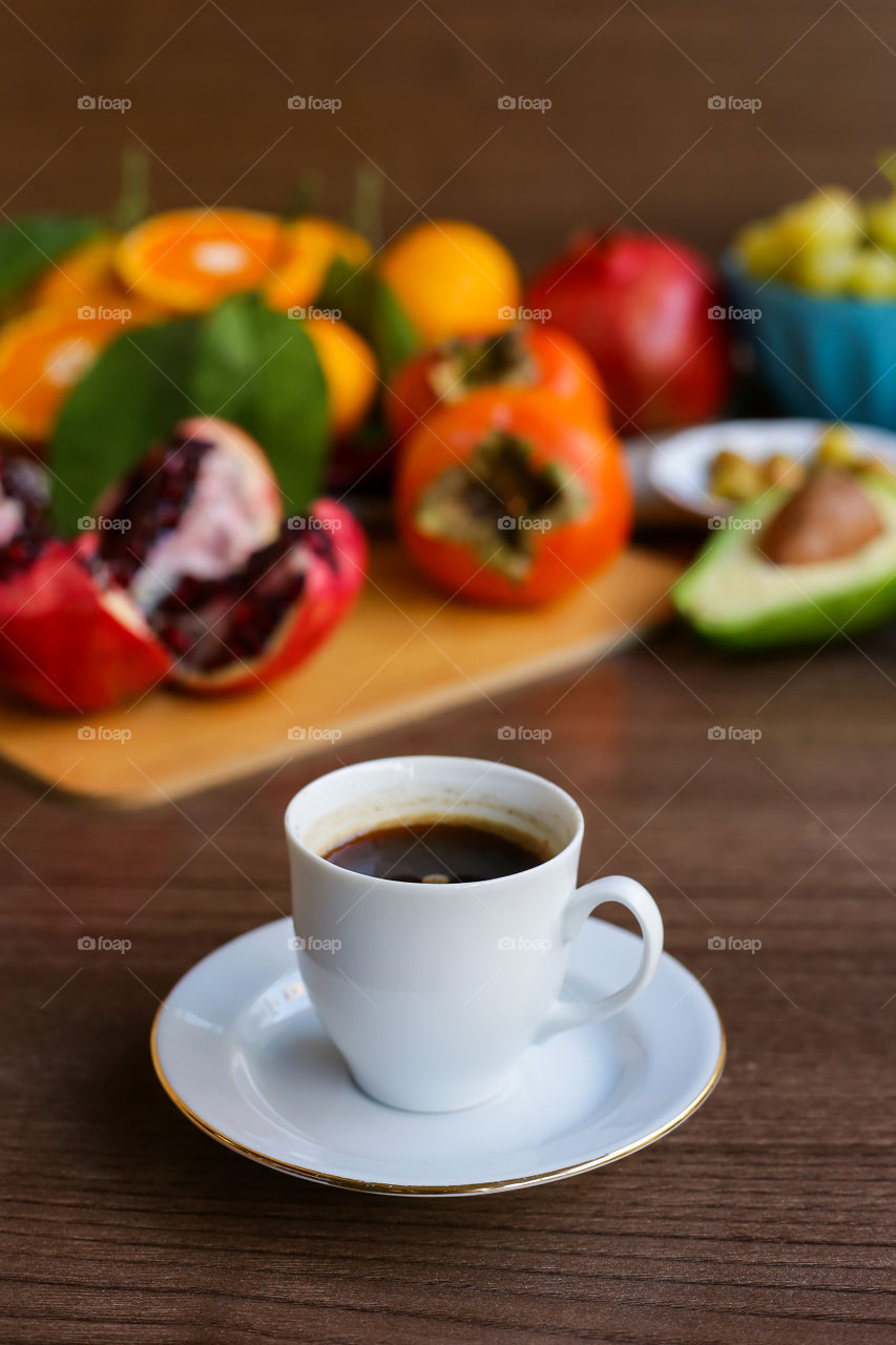 Coffee and fruits on the kitchen 