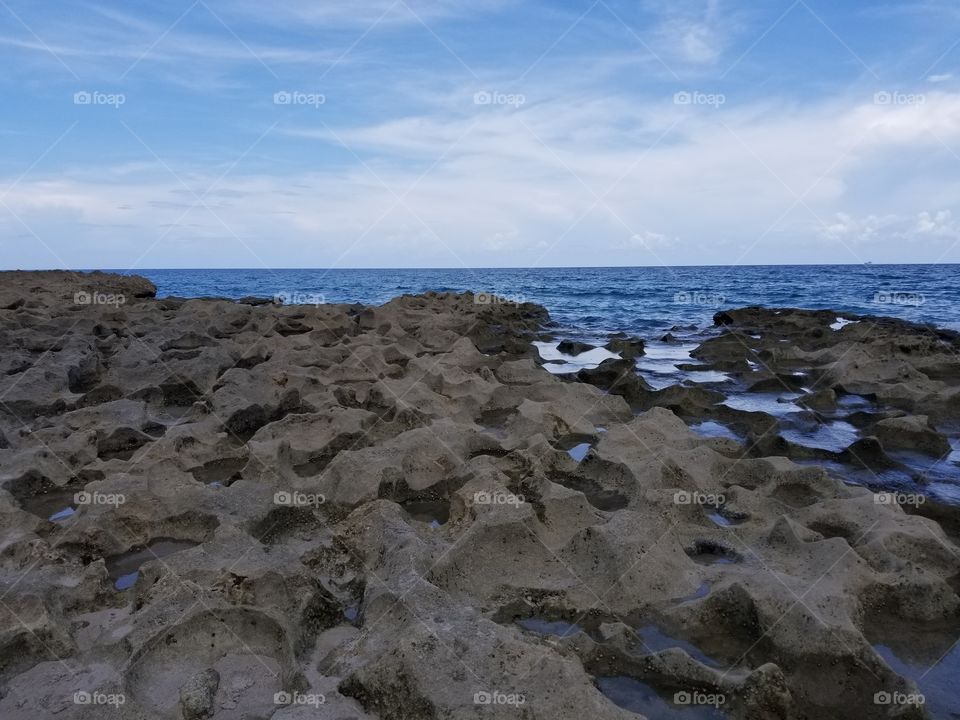 rocks ocean sky