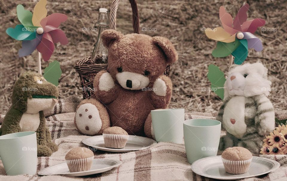 Old fashioned teddy bear picnic with plush toys