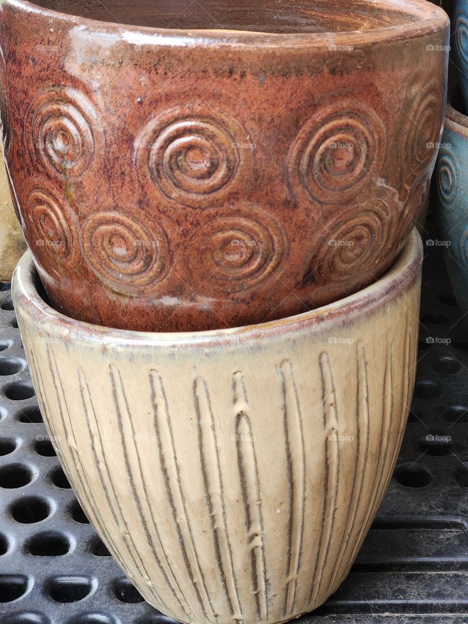 stacked brown planter pots for gardening