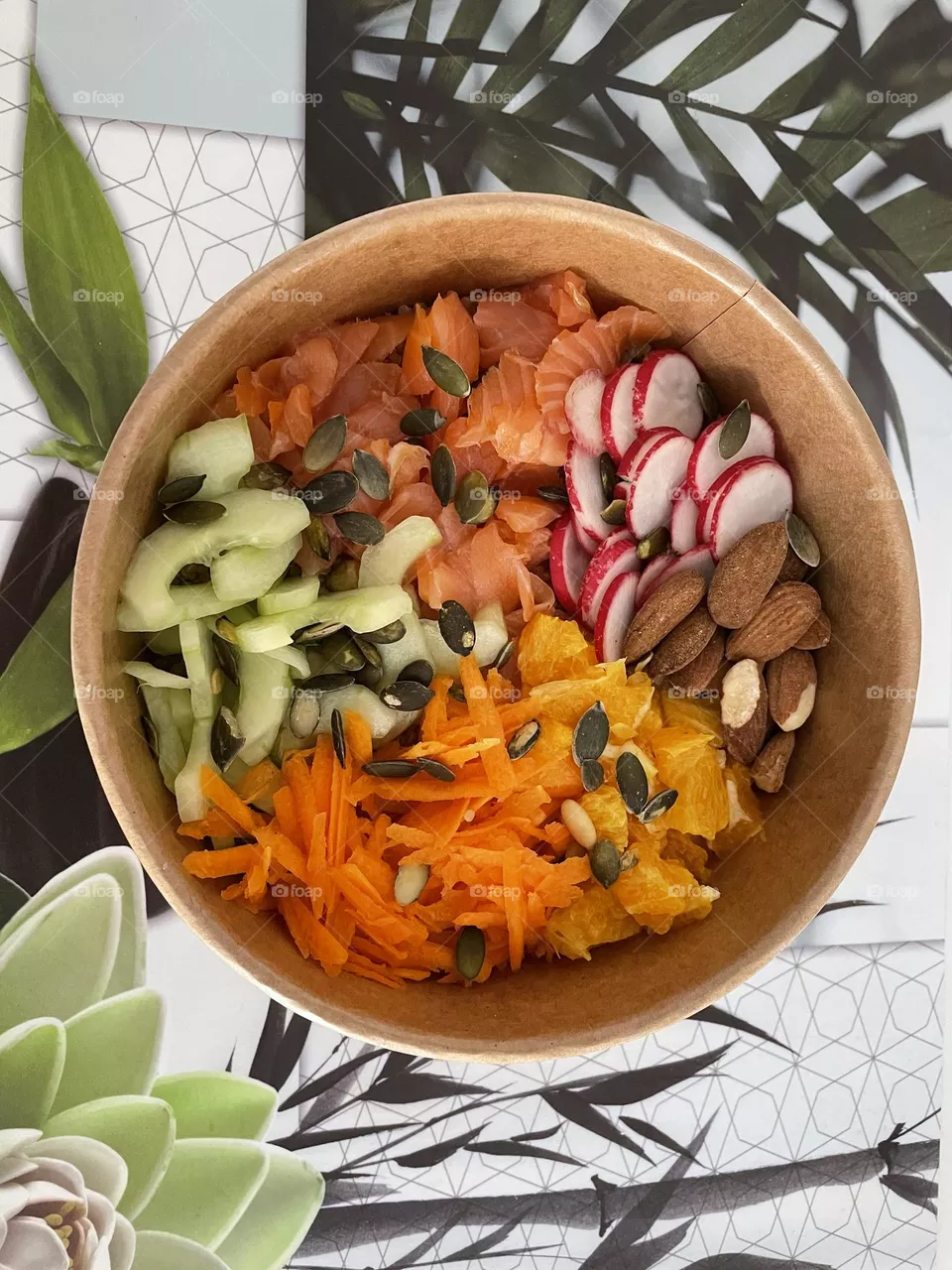 Poke bowl with almond carrots salmon 