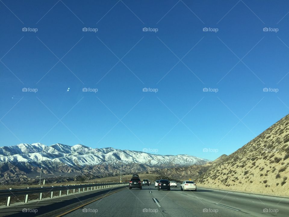 Highway
Snow
Mountain