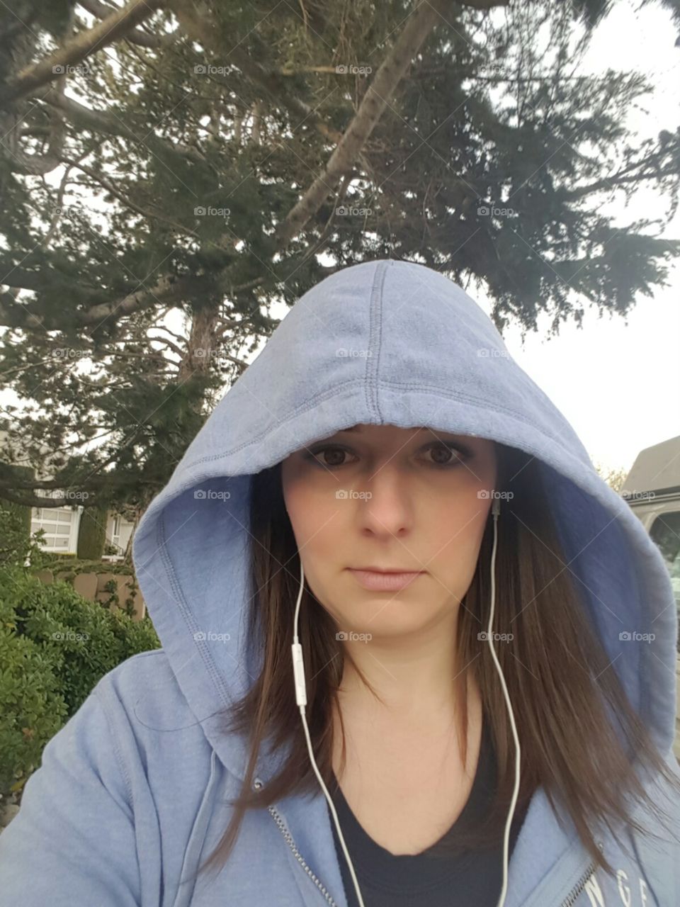 woman walking hood outside