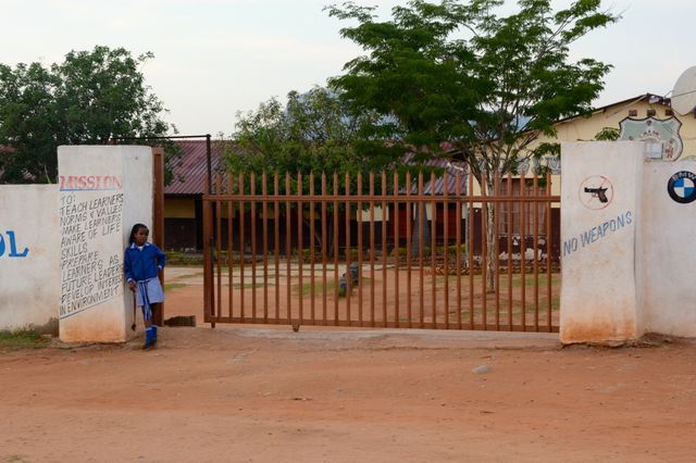 School girl waiting in rural South Africa