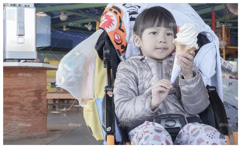 Japanese girl holding ice cream