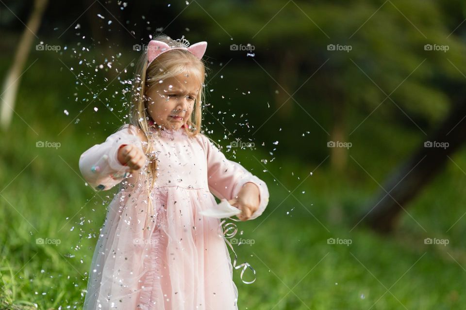 Little Caucasian girl feeling fear outdoor 