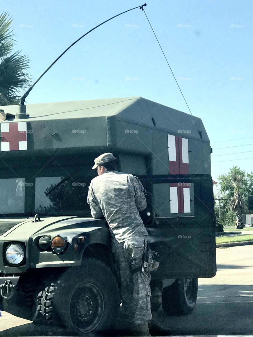 A soldier takes a break from Hurricane Harvey relief efforts