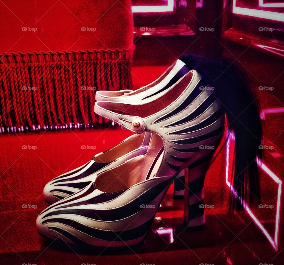 Black and White Shoes on Red Background 