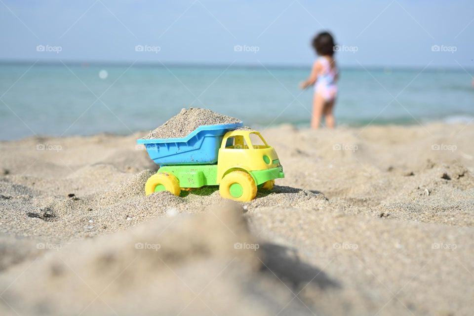 pickup truck carrying sand