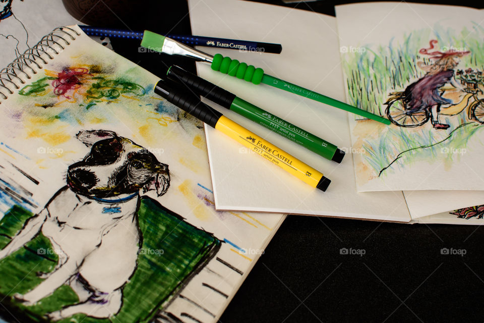 Dog portrait and sketches on desk Sketching with Faber-Castell PITT Artist pens using watercolor techniques 