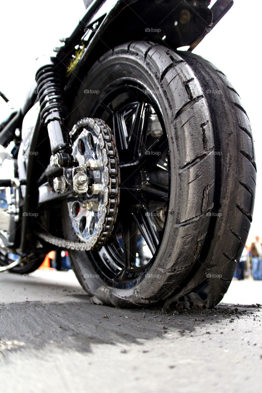 Harley burnout until the tire explodes.
